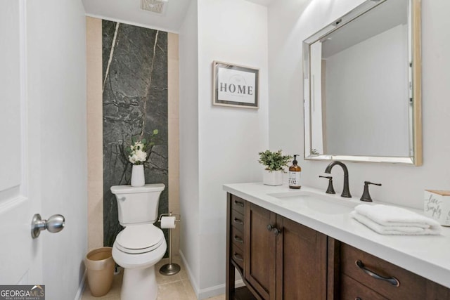 full bathroom with tile patterned flooring, toilet, visible vents, vanity, and baseboards