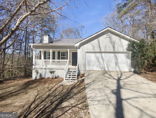 ranch-style home with an attached garage, covered porch, driveway, and a chimney