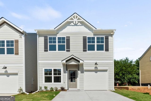 view of front of property with a garage, driveway, and board and batten siding