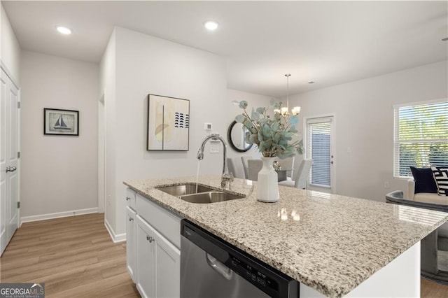 kitchen featuring a chandelier, recessed lighting, a sink, light wood-style floors, and dishwasher