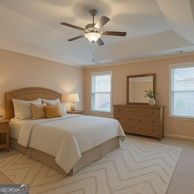6650 Canyon Cv, Cumming, GA 30028 - bedroom featuring a raised ceiling, carpet, crown molding, ceiling fan, and baseboards