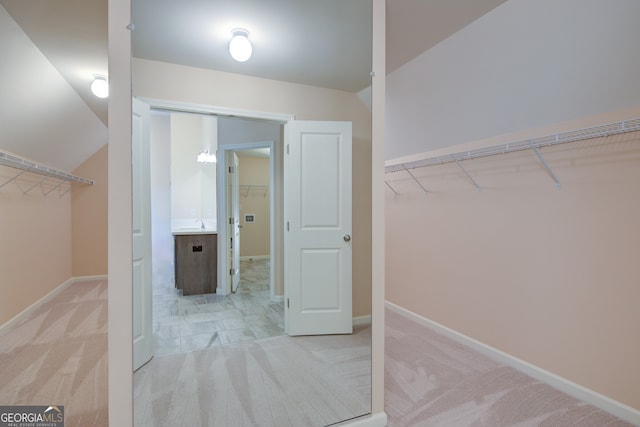 6650 Canyon Cv, Cumming, GA 30028 - spacious closet featuring carpet floors