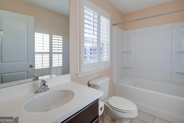 6650 Canyon Cv, Cumming, GA 30028 - full bathroom featuring toilet, vanity, shower / bathtub combination, and tile patterned flooring