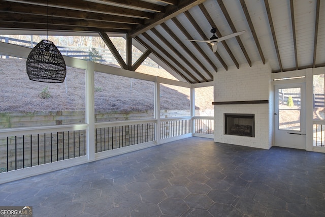 6650 Canyon Cv, Cumming, GA 30028 - view of patio featuring a fireplace and ceiling fan