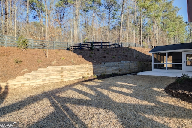 6650 Canyon Cv, Cumming, GA 30028 - fenced backyard featuring a patio