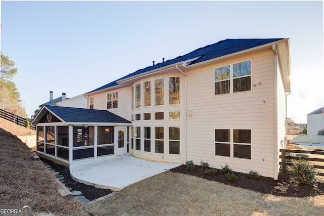 6650 Canyon Cv, Cumming, GA 30028 - rear view of property with a sunroom, fence, and a patio