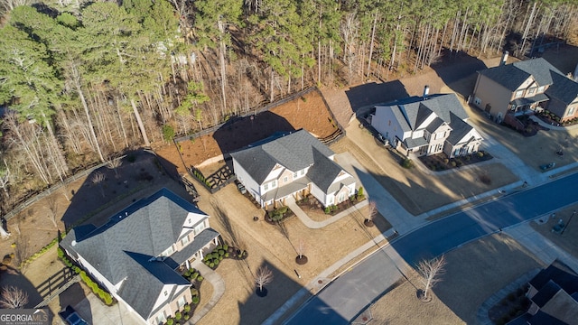 6650 Canyon Cv, Cumming, GA 30028 - aerial overview of property's location with a forest