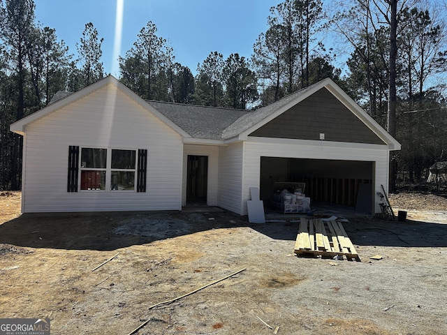 view of front of home featuring a garage