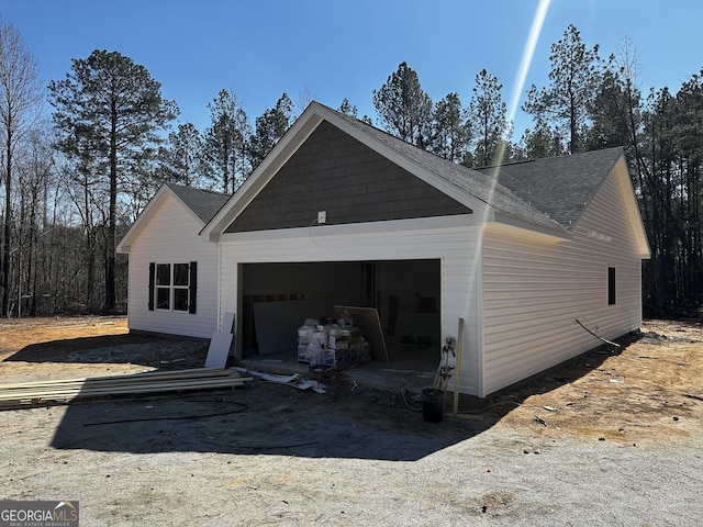 view of home's exterior with a garage