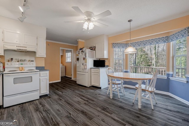 kitchen with crown molding, white appliances, white cabinetry, and under cabinet range hood