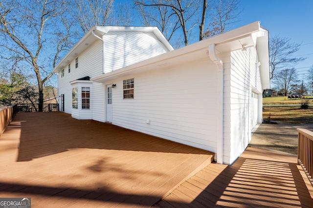 view of home's exterior with a deck