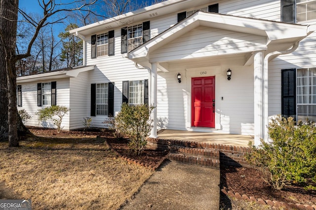 doorway to property featuring a porch