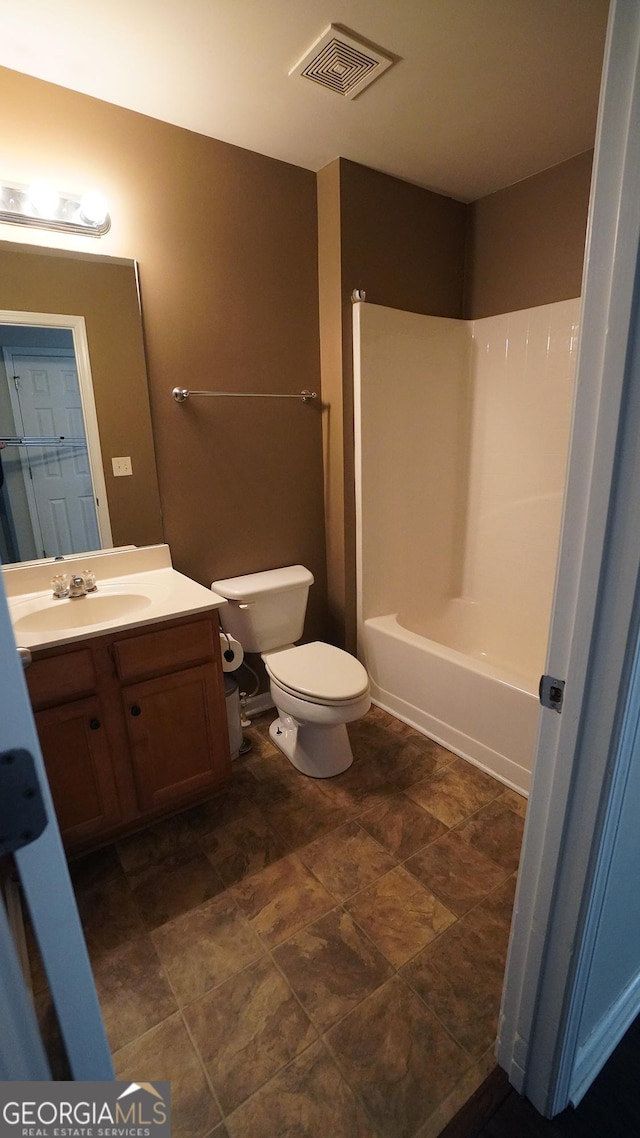 full bath featuring toilet, tub / shower combination, vanity, and visible vents