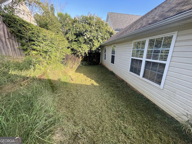 view of yard featuring fence