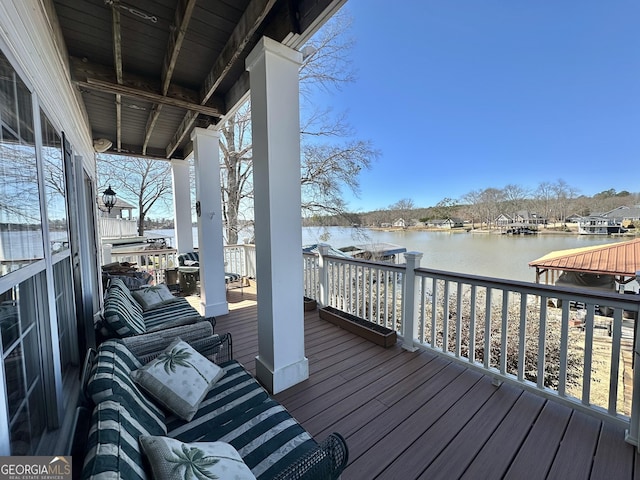 deck featuring a water view