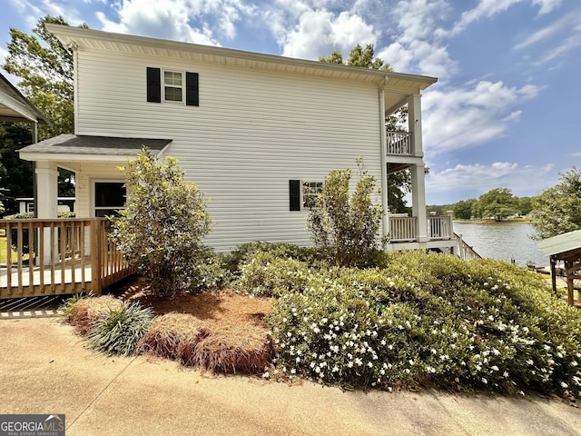 375 Templeton Cir, Mansfield, GA 30055 - view of side of home with a deck with water view