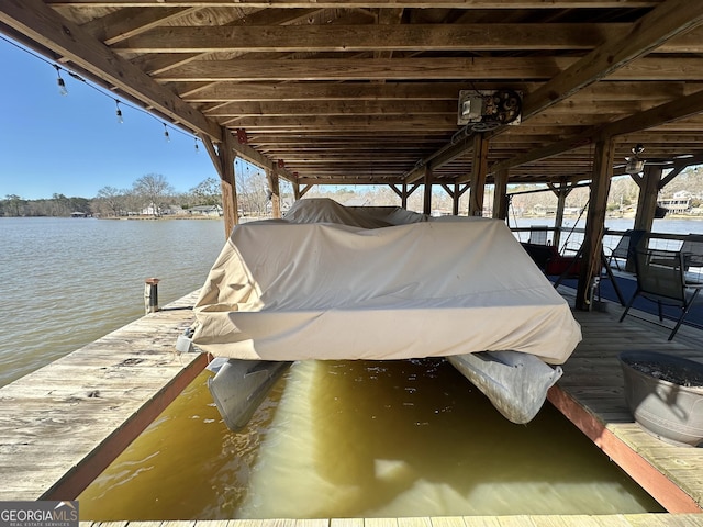 view of dock with a water view