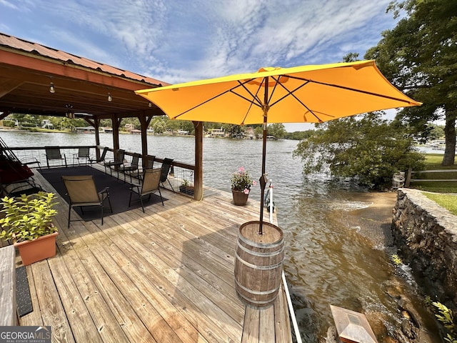 375 Templeton Cir, Mansfield, GA 30055 - wooden deck with a water view