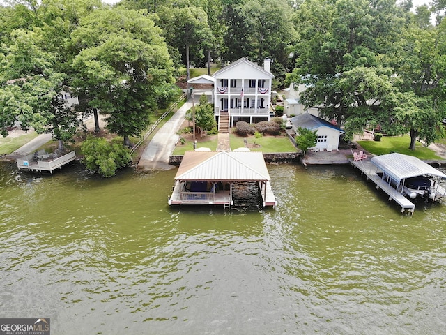 375 Templeton Cir, Mansfield, GA 30055 - dock with boat lift and a water view