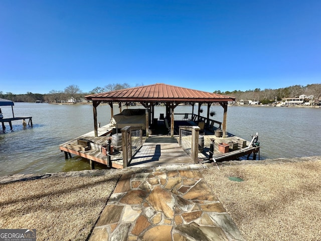 view of dock with a water view and boat lift