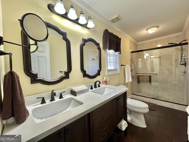 375 Templeton Cir, Mansfield, GA 30055 - bathroom featuring toilet, a stall shower, double vanity, and ornamental molding