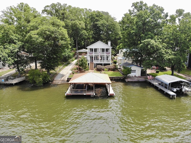 375 Templeton Cir, Mansfield, GA 30055 - dock area with boat lift, a water view, and stairs