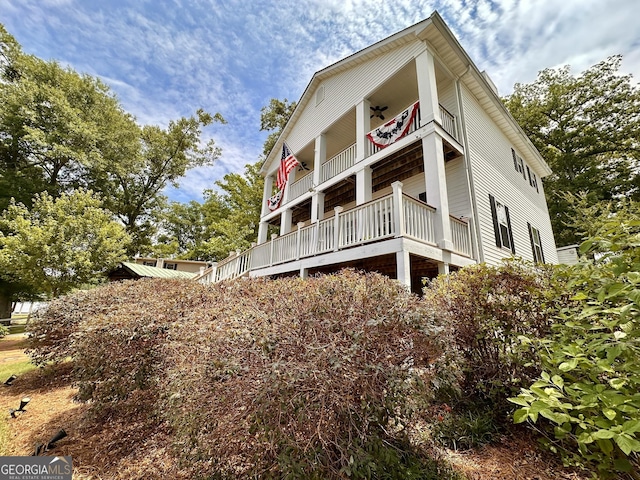 375 Templeton Cir, Mansfield, GA 30055 - view of property exterior featuring a balcony and ceiling fan