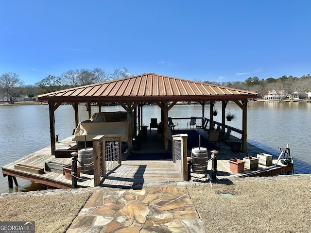 view of dock featuring a water view and boat lift