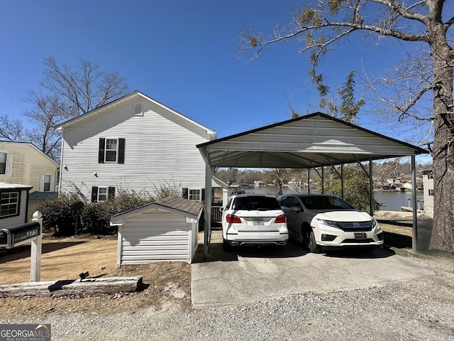 exterior space featuring driveway and a carport