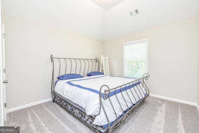 bedroom with carpet flooring, visible vents, and baseboards