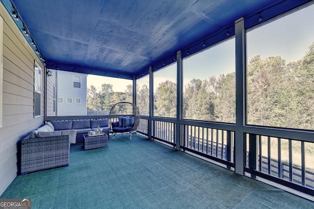 sunroom / solarium with wood ceiling