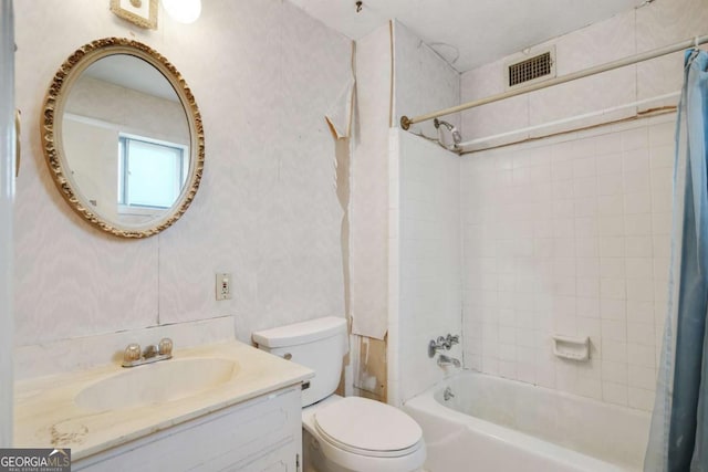 bathroom with shower / tub combo, wallpapered walls, visible vents, toilet, and vanity