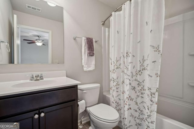 bathroom featuring toilet, shower / tub combo, visible vents, and vanity