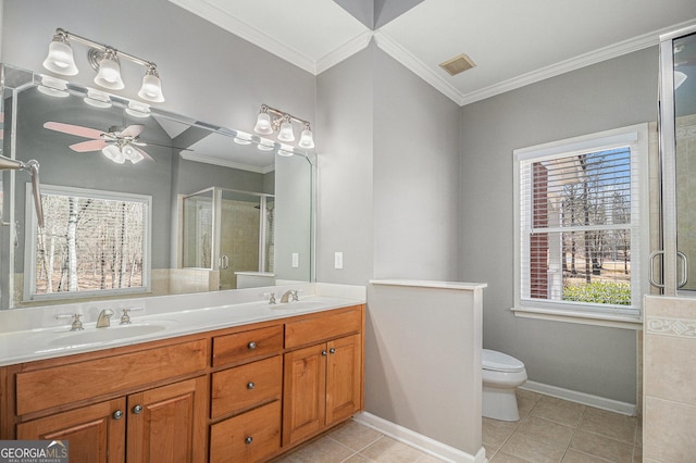 full bath featuring ornamental molding, a stall shower, a sink, and tile patterned floors