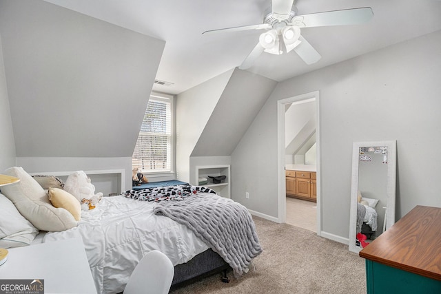 bedroom with lofted ceiling, ceiling fan, light colored carpet, visible vents, and baseboards