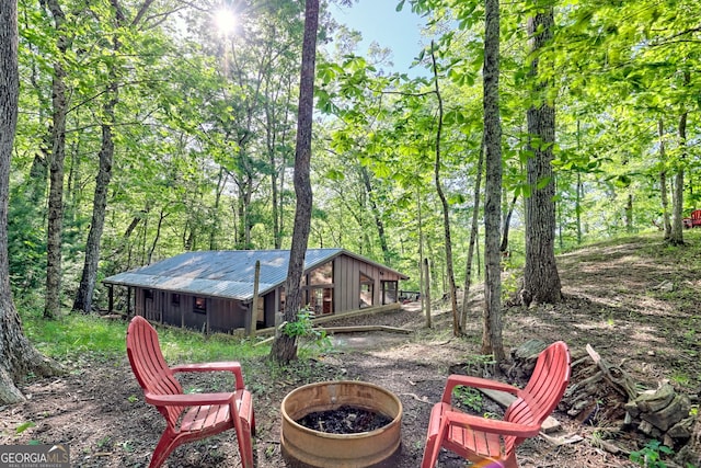 185 Pope Dickson Ln, Clarkesville, GA 30523 - view of yard with a fire pit and a forest view