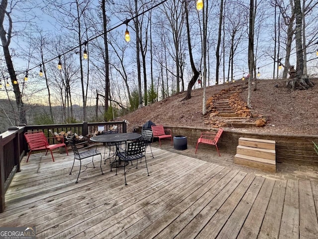 deck featuring outdoor dining space