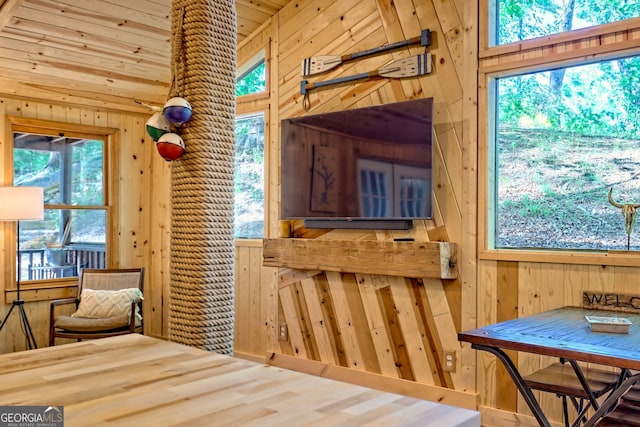 185 Pope Dickson Ln, Clarkesville, GA 30523 - dining space featuring wooden walls, lofted ceiling, wood finished floors, and wood ceiling