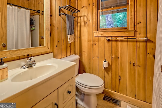 185 Pope Dickson Ln, Clarkesville, GA 30523 - full bathroom featuring wood walls, vanity, a shower with curtain, and tile patterned floors