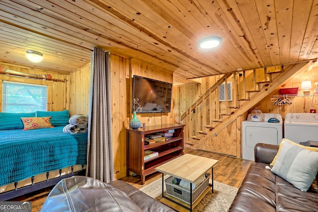 185 Pope Dickson Ln, Clarkesville, GA 30523 - living area featuring wood ceiling, wood walls, independent washer and dryer, stairway, and wood finished floors