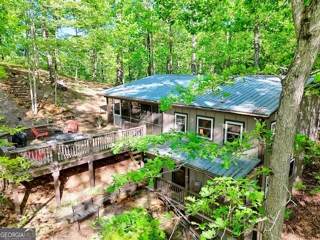 185 Pope Dickson Ln, Clarkesville, GA 30523 - rear view of property featuring a sunroom, a metal roof, and a wooden deck