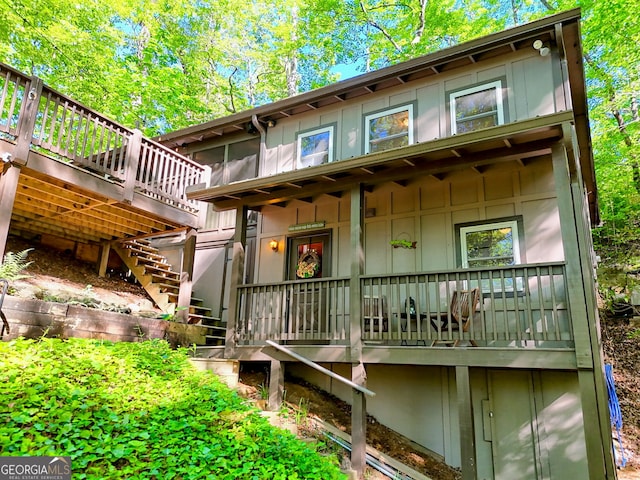 185 Pope Dickson Ln, Clarkesville, GA 30523 - rear view of property with stairway, a deck, and board and batten siding