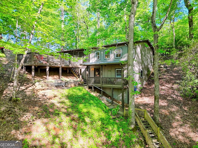 185 Pope Dickson Ln, Clarkesville, GA 30523 - back of property with stairway and a wooden deck