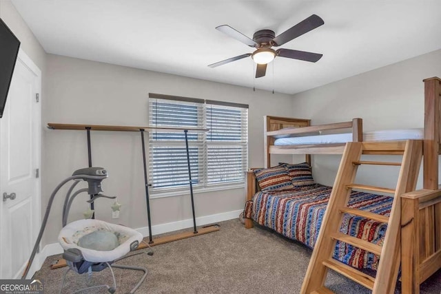 bedroom with carpet, ceiling fan, and baseboards