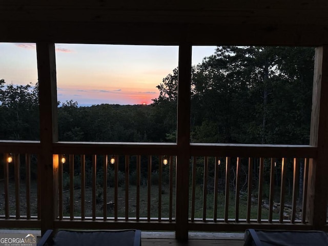 1172 Hunter Dr, Ranger, GA 30734 - view of deck at dusk