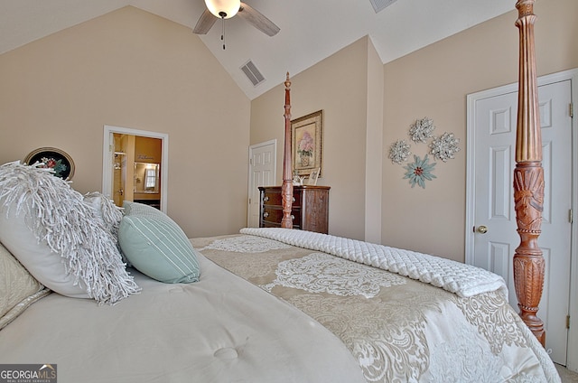 bedroom featuring high vaulted ceiling, a ceiling fan, visible vents, and ensuite bathroom