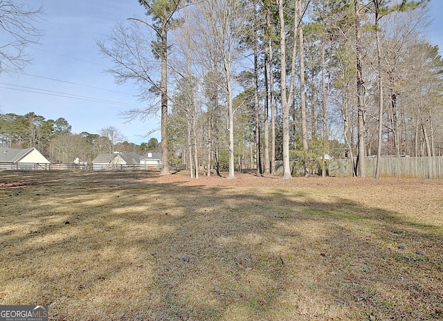 view of yard with fence