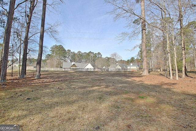 view of yard with fence