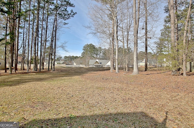 view of yard with fence