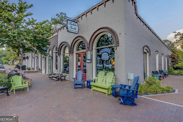 surrounding community featuring a patio area